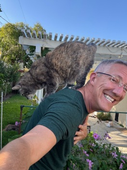 Ryan, Bright Electrolytes co-founder, with his cat Oatie, enjoying a sunny day